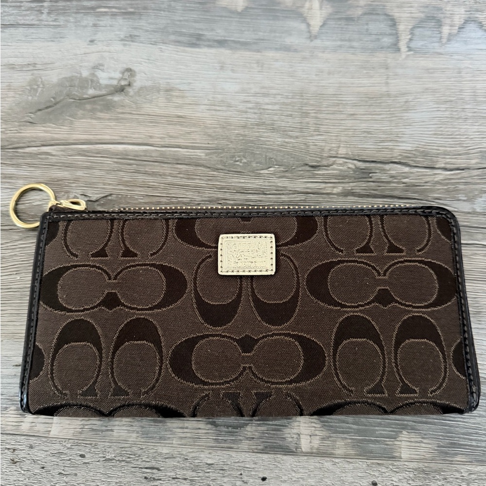 Coach Poppy Signature C zip-around wristlet wallet in brown signature fabric